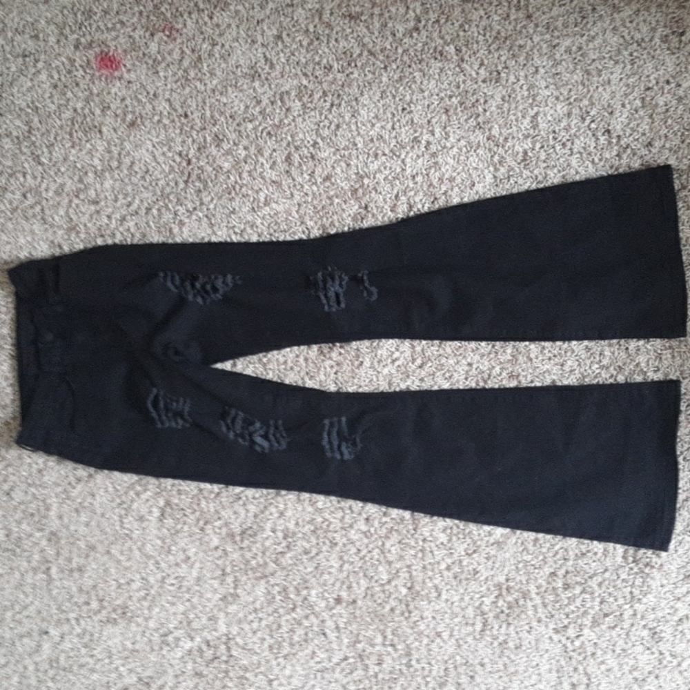 Ripped flared black high rise jeans